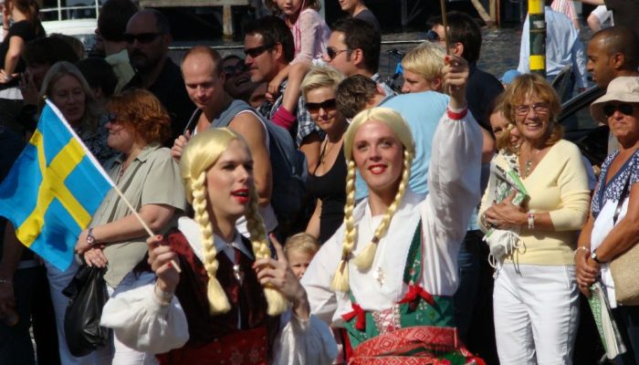 sweden-festival-holding-flag